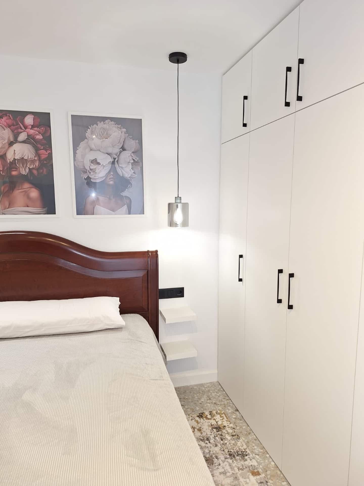 Bedroom 1: bed and wardrobes