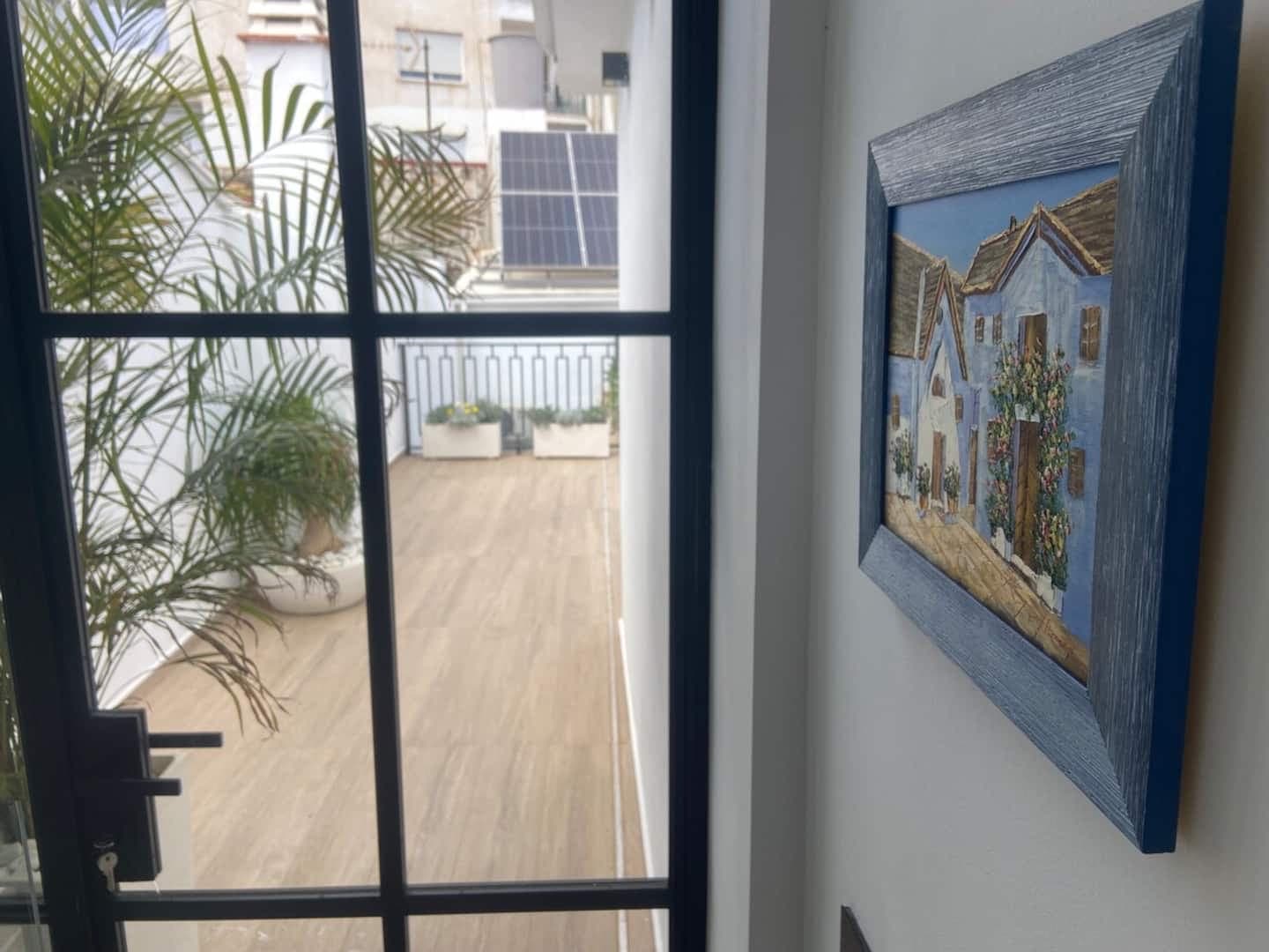 Patio: glass door onto the courtyard